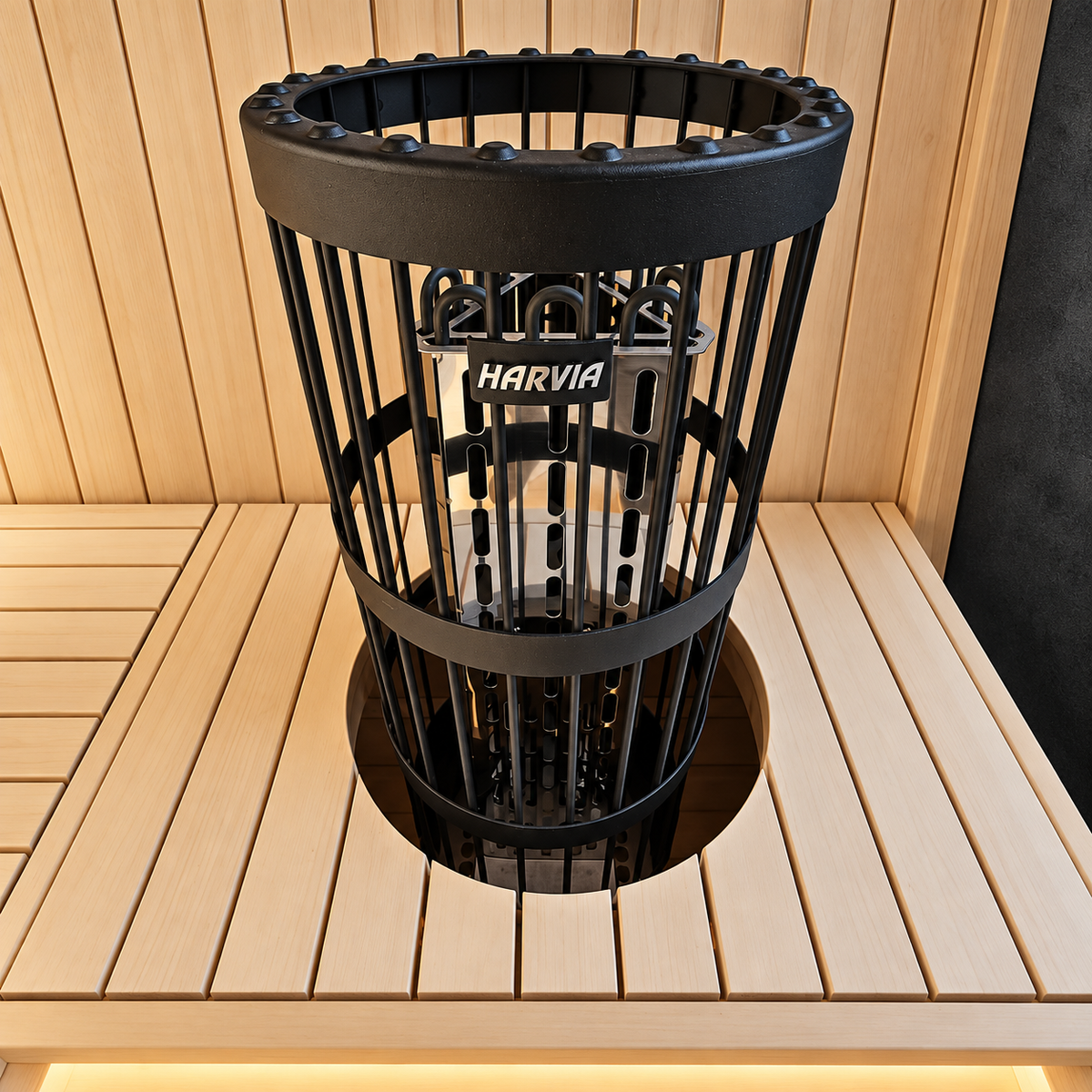 Harvia Legend 10.8kW heater in black, filled with sauna stones