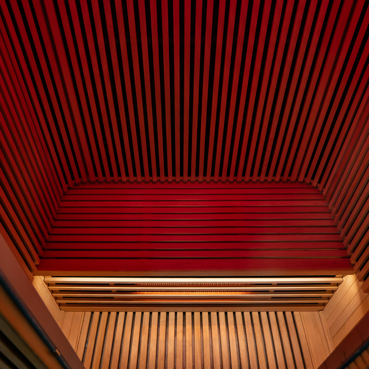 Curved Hemlock seating that follows the cabin walls