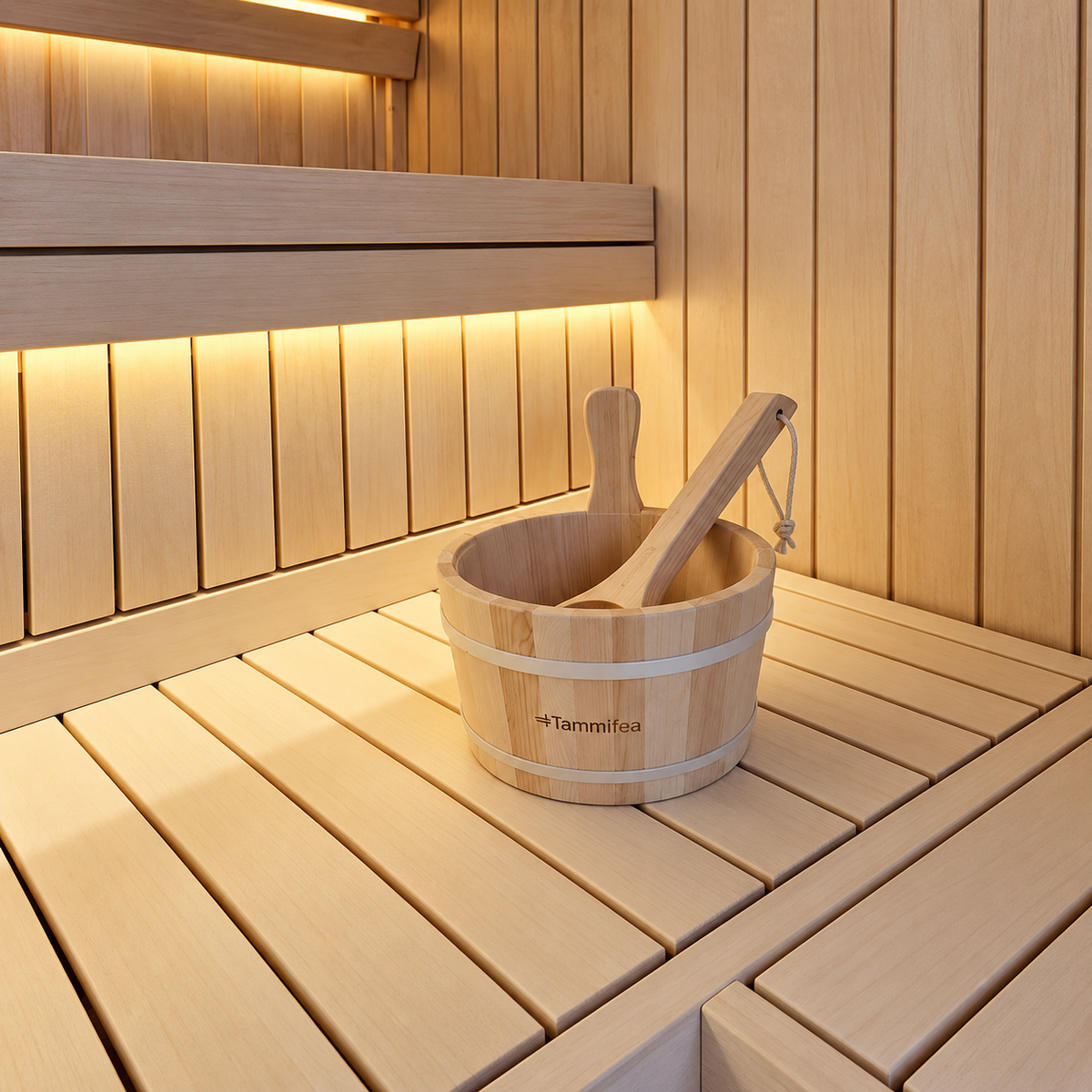 Wooden sauna bucket and ladle on the bench